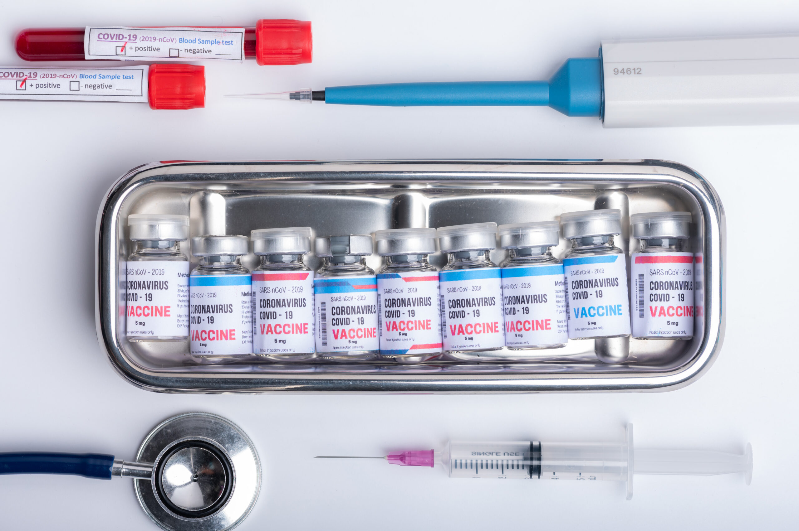 virus vaccine development of a coronavirus COVID-19, vaccine bottle in concept of insurance and fight against coronavirus 2019 ncov cure, medical research in laboratory to stop the spread of the virus