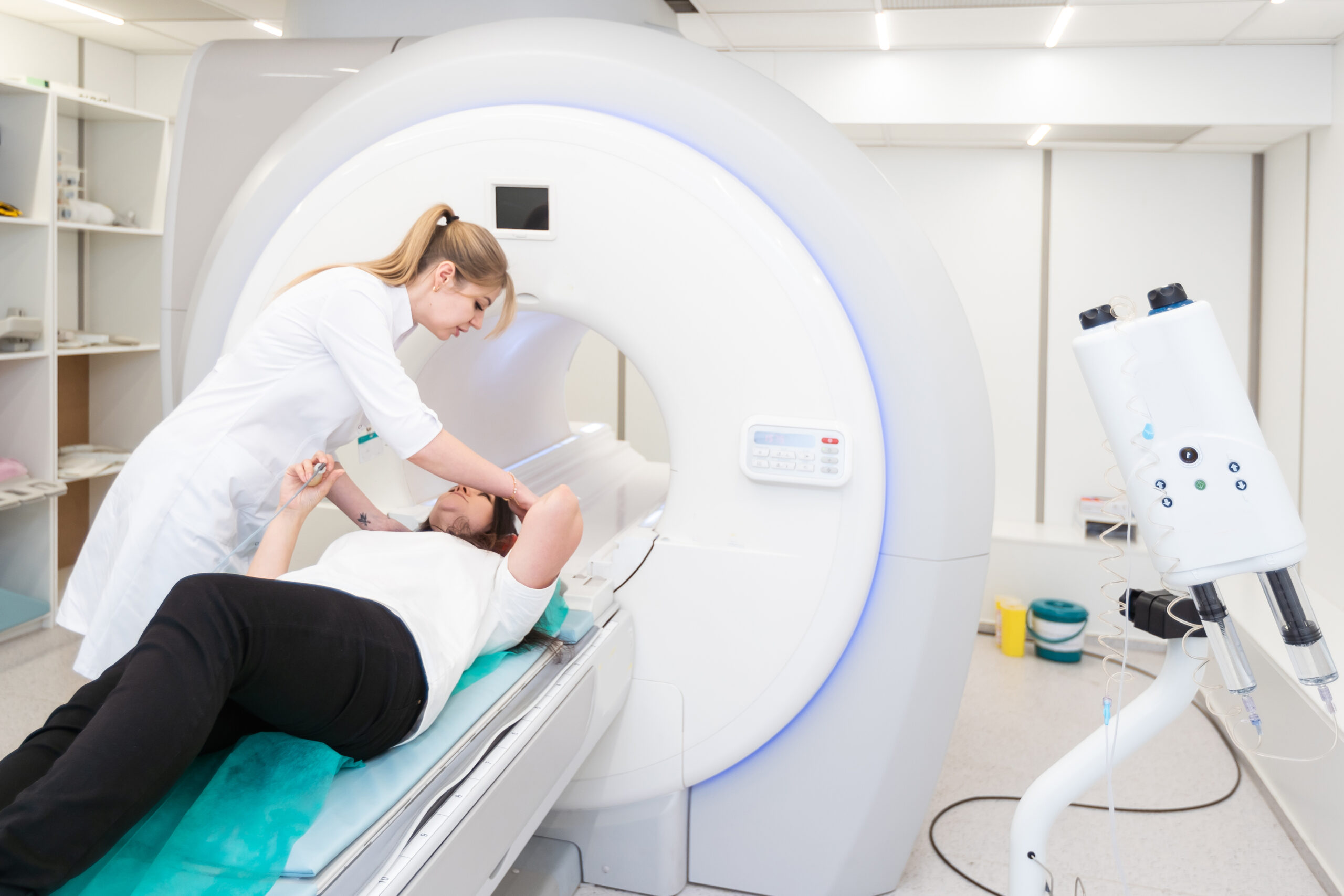 Female patient undergoing MRI - Magnetic resonance imaging in Hospital. Medical Equipment and Health Care