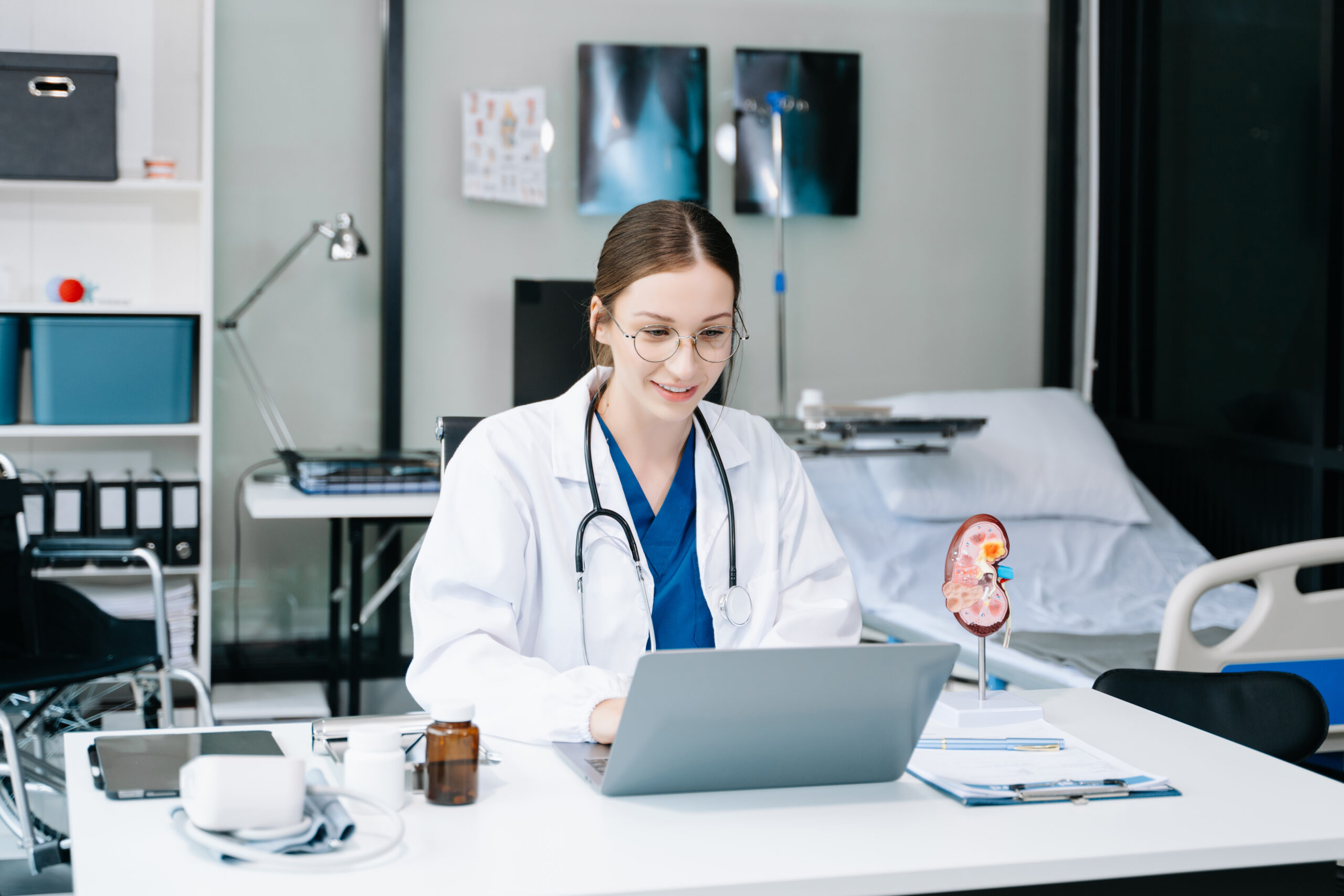 Confident young Caucasian female doctor in white medical uniform