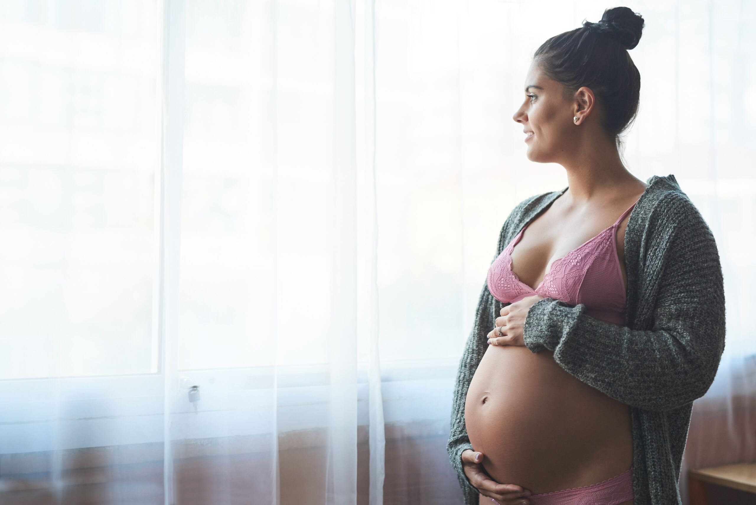 cropped-shot-of-an-attractive-young-pregnant-woman-2025-04-06-03-36-42-utc