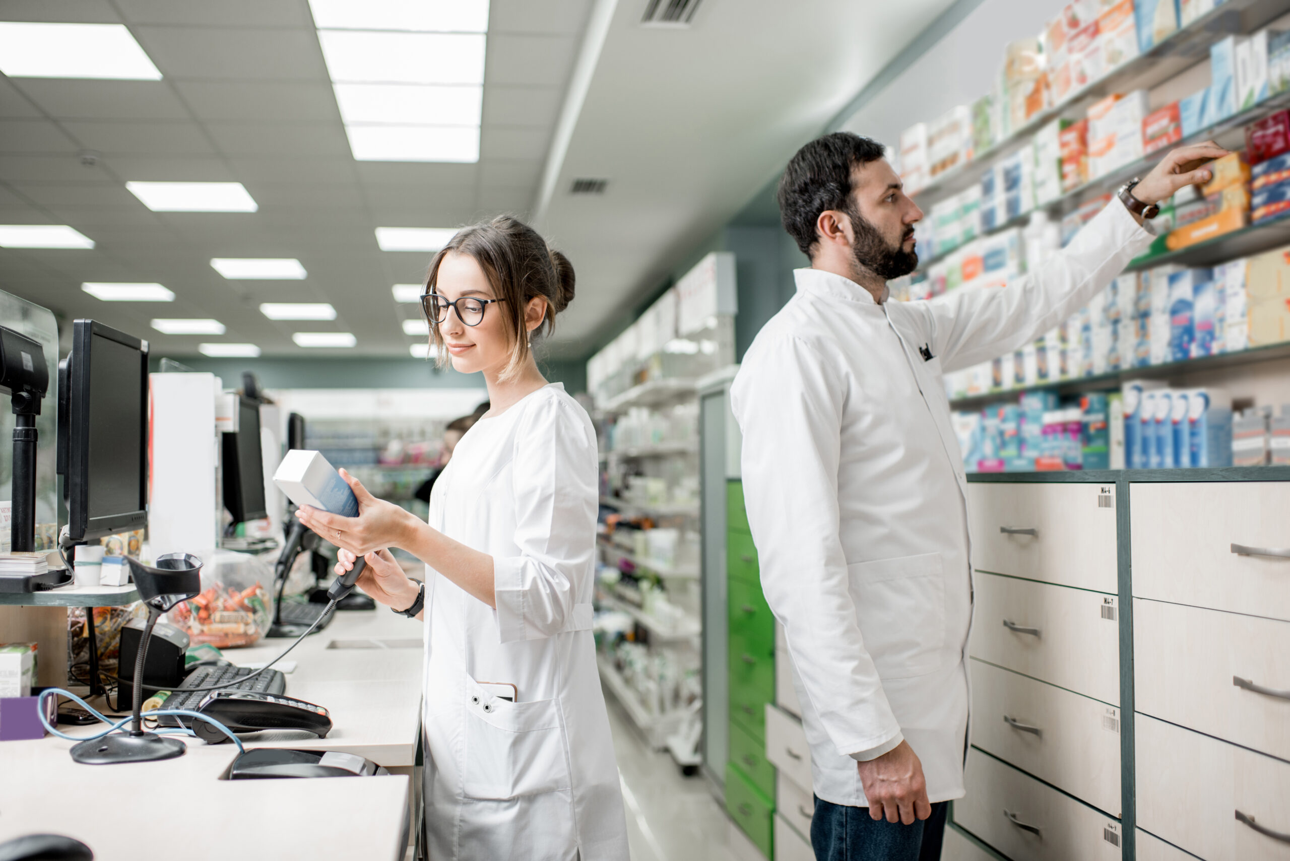 Pharmacists working in the pharmacy store