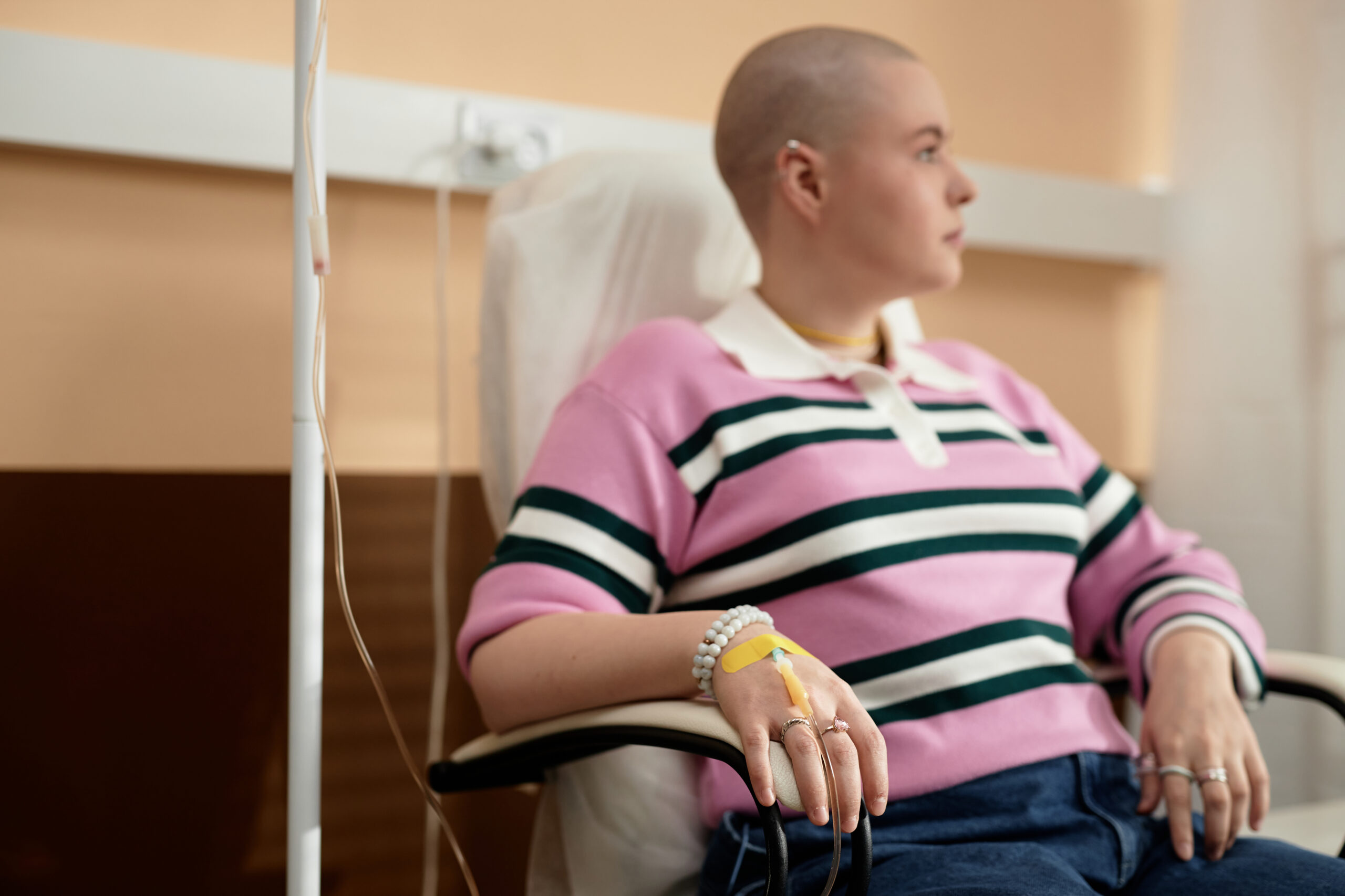 Selective Focus on Hand With Medical Tubes